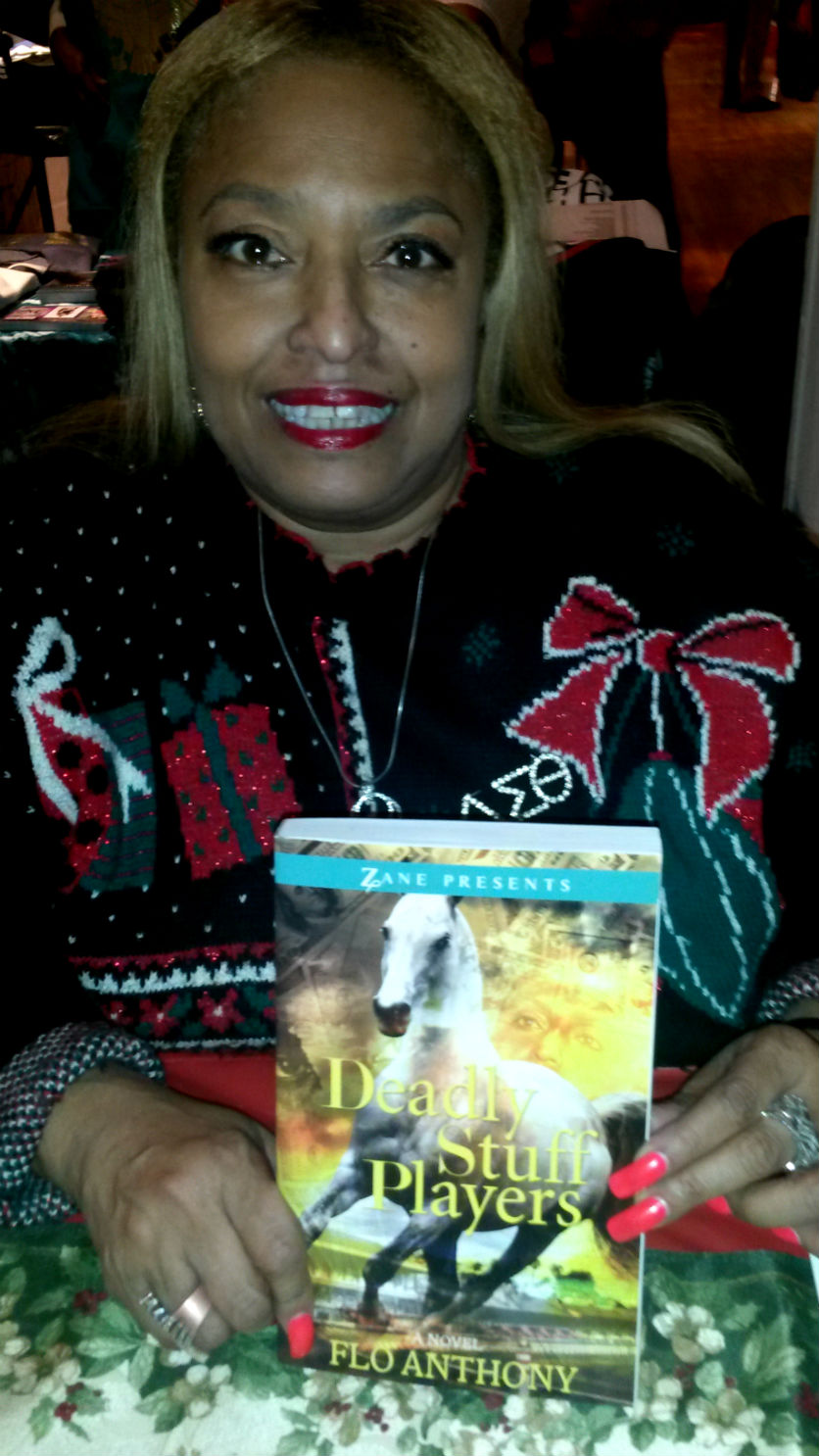 Ms. Flo Anthony of TV1 notoriety here at Black Expo with her second tome Deadly Stuff Players a blac